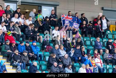 2022 Physical Disability Rugby League World Cup at Victoria Park, Warrington. Australia v New Zealand. Fans hold placards as New Zealand score a try Stock Photo