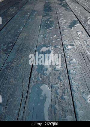Drops of water on a old gray-painted wooden planks detailed texture background for vertical story Stock Photo