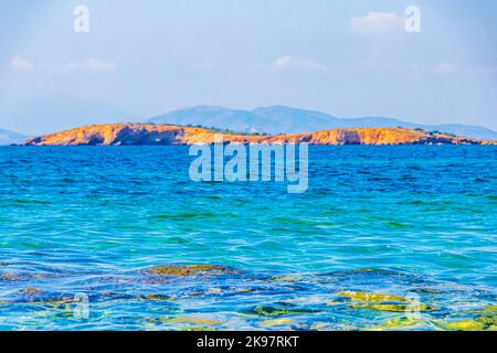 Beautiful Kavouri beach and bay with turquoise blue water and nature in Voula Vouliagmeni Attica Greece. Stock Photo