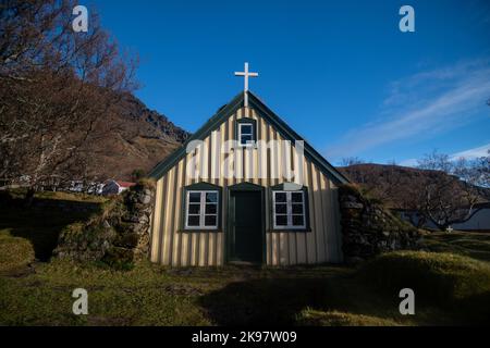 Hofskirkja, is the last turf church built in Iceland. Was constructed in 1884, and restored in the 1950’s. It’s still a practicing parish. Stock Photo