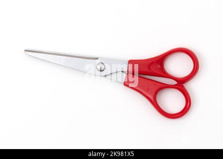 Red Scissors isolated on white background. Stock Photo