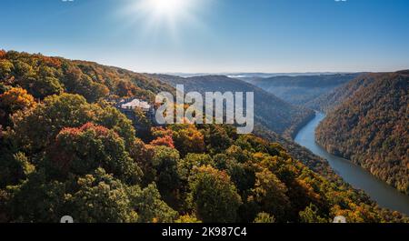 View up the Cheat River in narrow wooded gorge in the autumn with Coopers Rock overlook in the colorful trees near Morgantown, West Virginia Stock Photo