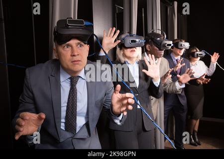 Happy man wearing VR glasses Stock Photo