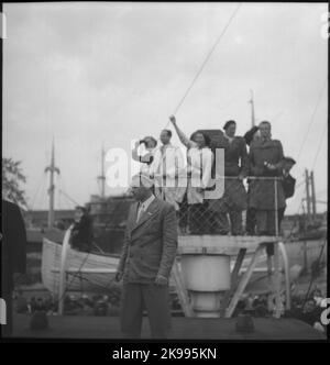 Danish refugees on their way home, aboard the train ferry Malmö. Here on the way to Copenhagen. Stock Photo