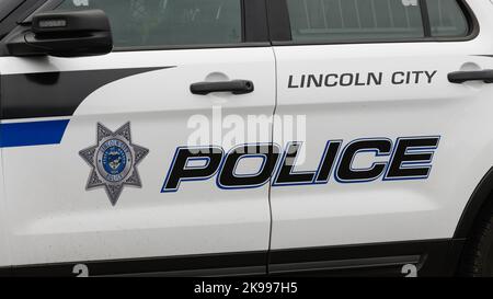 Lincoln City, OR, USA - September 15, 2022; Detail of Lincoln City Police Car with badge and logo on the Oregon Coast Stock Photo