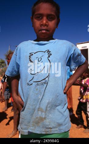 YOUNG ABORIGINAL BOY, YUELAMU ABORIGINAL COMMUNITY (MOUNT ALLAN SCHOOL) NORTHERN TERRITORY, AUSTRALIA. Stock Photo