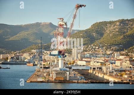 Toulon port city on southern France Mediterranean coast,  cranes on the dock Stock Photo