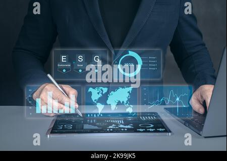 Digital Transformation. modern virtual interface. Double exposure engineering using tablet computer digital technology interfaces. Man with futuristic Stock Photo