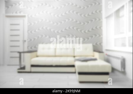 blurry living room with sofa and grey wave wall background. home style for house, Interior of living room with sofa. Defocused Image Of Sofa In Living Stock Photo