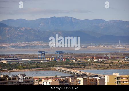 Port town Cagliari capital city of the Italian Mediterranean   island of Sardinia. Docks looking towards the mountains Stock Photo