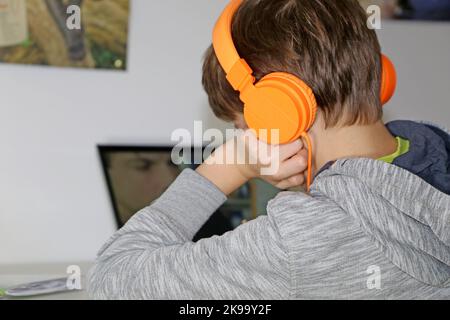 Symbol image: Elementary school student doing digital homeschooling (model released) Stock Photo