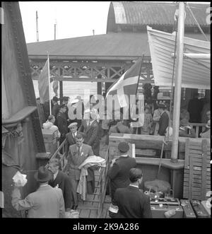 Danish refugees on their way home board the train ferry Malmö. Stock Photo