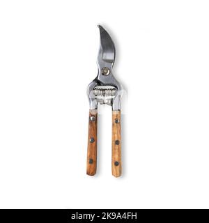 Garden secateurs with wooden handle isolated on a white background. Old garden prun. Stock Photo