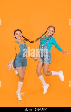 Children ukrainian young generation. Patriotism concept. Girls with blue and yellow clothes. Freedom value. Living happy life in free country Stock Photo