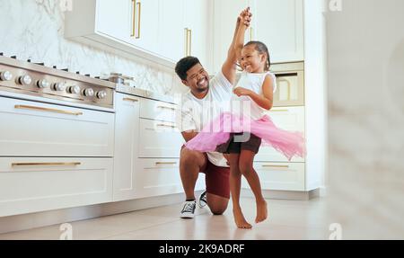 Dad, girl and ballet dance of a child in a home kitchen dancing together and bonding. Family man, father and kid dancer having fun and spending Stock Photo