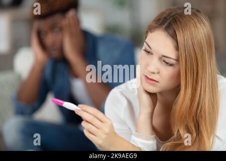 couple not talking after a dispute about pregnancy Stock Photo