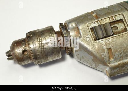 Head of used electric hand drill Stock Photo