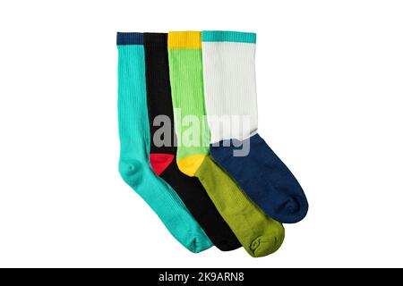 Multicolored socks set in different designs, Knitted knee high socks. High resolution photo isolated on white background. Stock Photo