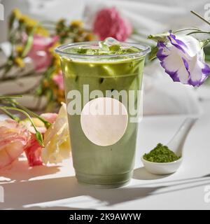 Iced Matcha Green Tea Latte. Smooth and creamy matcha sweetened just right and served with milk over ice. Green has never tasted so good. Stock Photo