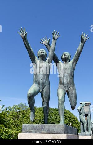 Two running boys, bronze sculptures on the Bridge of Vigeland Sculpture Park, Vigeland installation, Frogner Park, Oslo, Norway Stock Photo