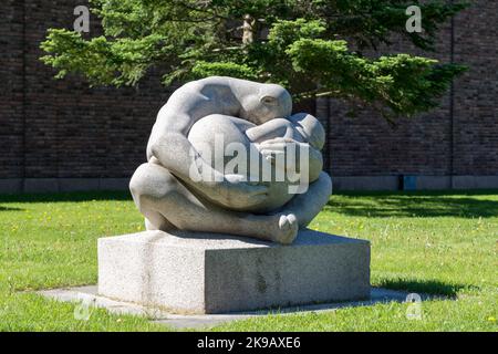 Two intertwined stone sculptures in front of the Vigeland Museum. Vigeland Sculpture Park, insatallation, Vigeland Park, Frogner Park, Oslo, Norway Stock Photo