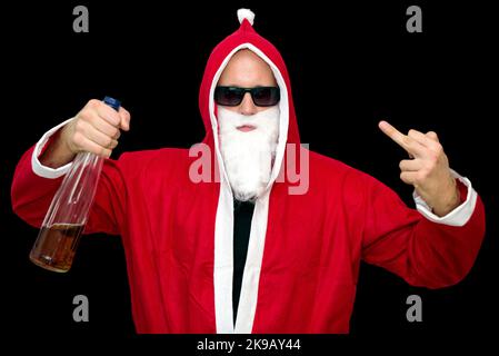 Santa Claus with bottle of alcohol on black backround Stock Photo