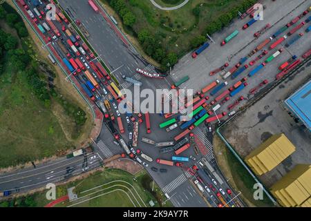 NANJING, CHINA - OCTOBER 27, 2022 - Aerial photo shows container trucks ...