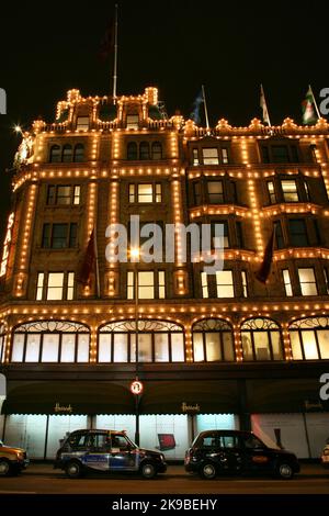 London, UK - January 11, 2011 : Night View of Harrods department store in the Brompton Road, near Knightsbridge Tube Station. This department store wa Stock Photo