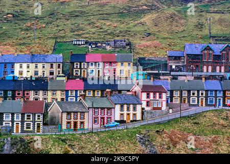 Colourful rows of terraced houses in the Rhondda Fach valley in south Wales, UK - originally miners' housing. Photo taken in 1980. Stock Photo