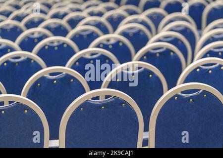 Empty conference hall - rear view of the seats Stock Photo