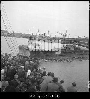 Danish refugees aboard the train ferry Malmö on their way home to Denmark. Stock Photo