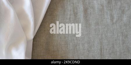 Abstract linen fabric texture background. Crumpled natural linen organic eco textiles canvas background. Top view Stock Photo