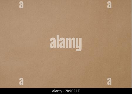 Brown color smooth flat paper texture macro close up view Stock Photo