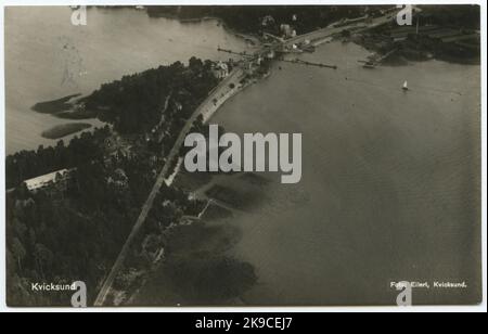 Aerial photo taken over Kvicksund's northern part, located on Key Island in Lake Mälaren, at the top of the picture you can see Kvicksund Bridge and the southern side of society. Stock Photo