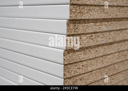 Chipboard Stack A stack of fiberboard in a store Stock Photo - Alamy