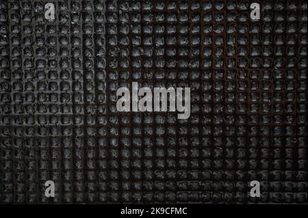 Surface mosaic black stone tiles wet background Stock Photo
