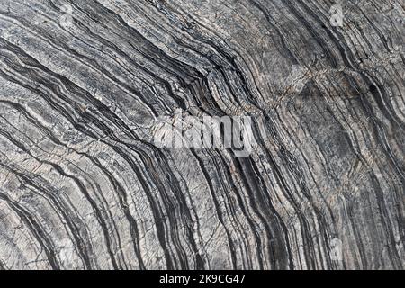 Rough striped granite slab table background Stock Photo