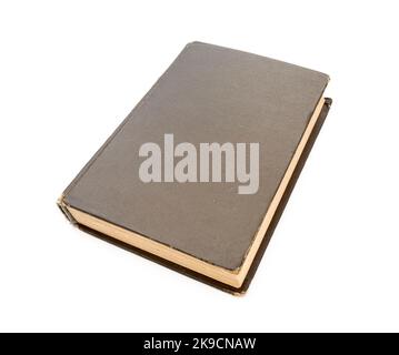 Closed brown vintage book with hard cardboard cover isolated on white Stock Photo