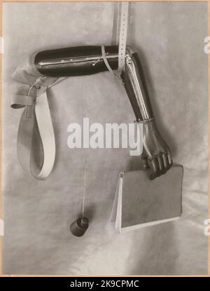 Photography from 'An account of manufacturing at the State Railway's prosthetic workshop in Nässjö', 1932. The arrest capacity of the arm is demonstrated. Stock Photo