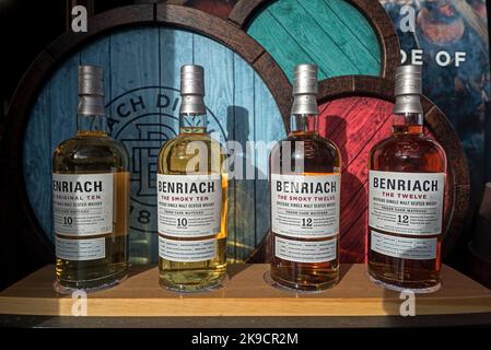 Bottles of 10 and 12 year-old Benriach Speyside single malt Scotch whisky in the window of a whisky shop on the Royal Mile, Edinburgh, Scotland. Stock Photo