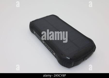 High capacity power bank with solar panel, ideal for traveling Stock Photo