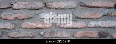 Old brick wall with shadow texture can be used as closeup Stock Photo