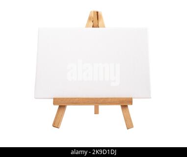Horizontal blank canvas mockup standing on artists tripod isolated on white background. High quality photo Stock Photo