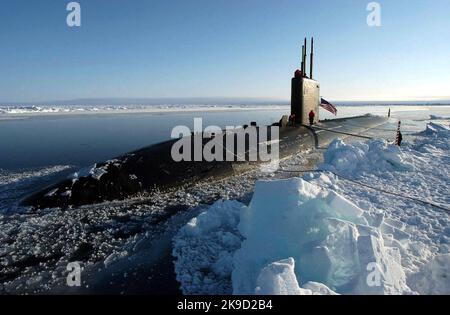 The US Navy (USN) Los Angeles class Attack Submarine USS Hampton (SSN 767) surfaces at the North Pole. Stock Photo