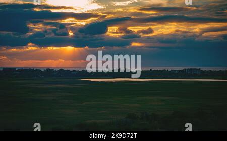 townscape at blue hour, dramatic cloudy sunset Stock Photo