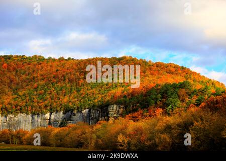 Sunset photo during the autumn as the trees change color at Roark Bluff in Steel Creek Campground along the Buffalo River located in the Ozark Mountai Stock Photo