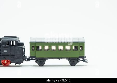 Partial view of vintage train toy on white background Stock Photo