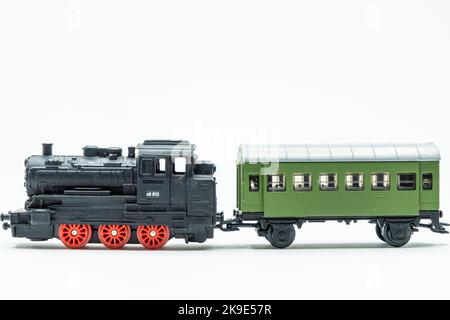 Old vintage train toy locomotive and wagon Stock Photo