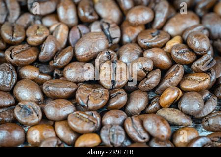 Macrophotography of coffee beans roasted naturally to enjoy their aroma and flavor. Stock Photo