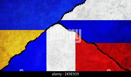 Russia, Ukraine and France flag together on wall. Diplomatic relations between Russia, France and Ukraine Stock Photo